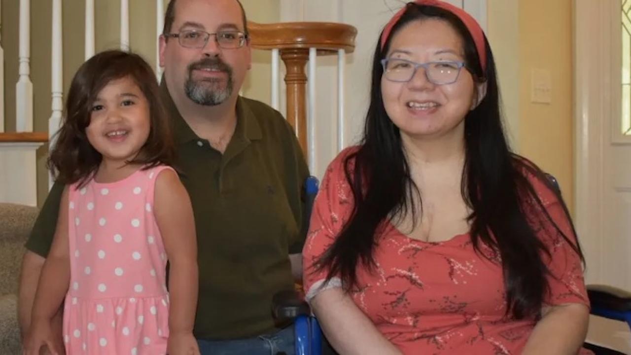 Jason and Julia with their daughter, Reina.