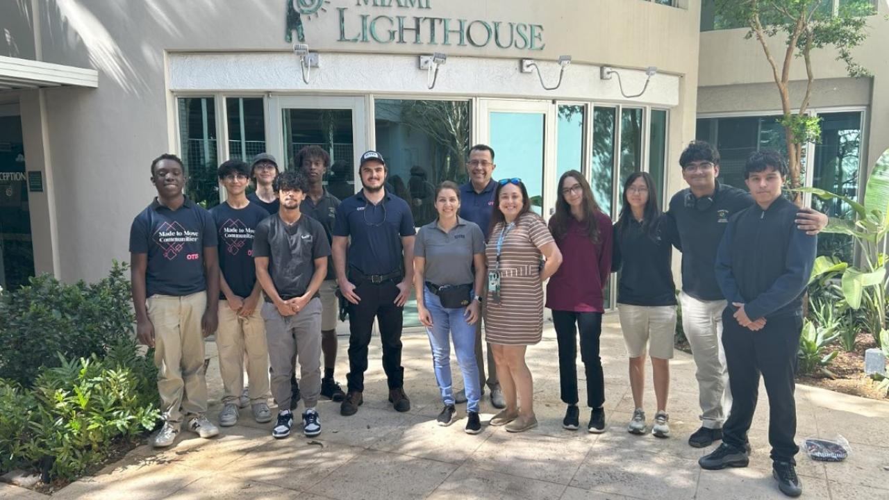  Student group in front of school entrance