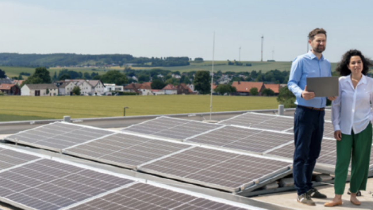 People looking at solar panels