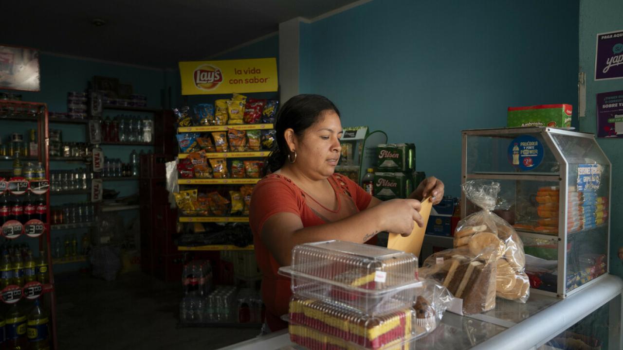 women at cash register