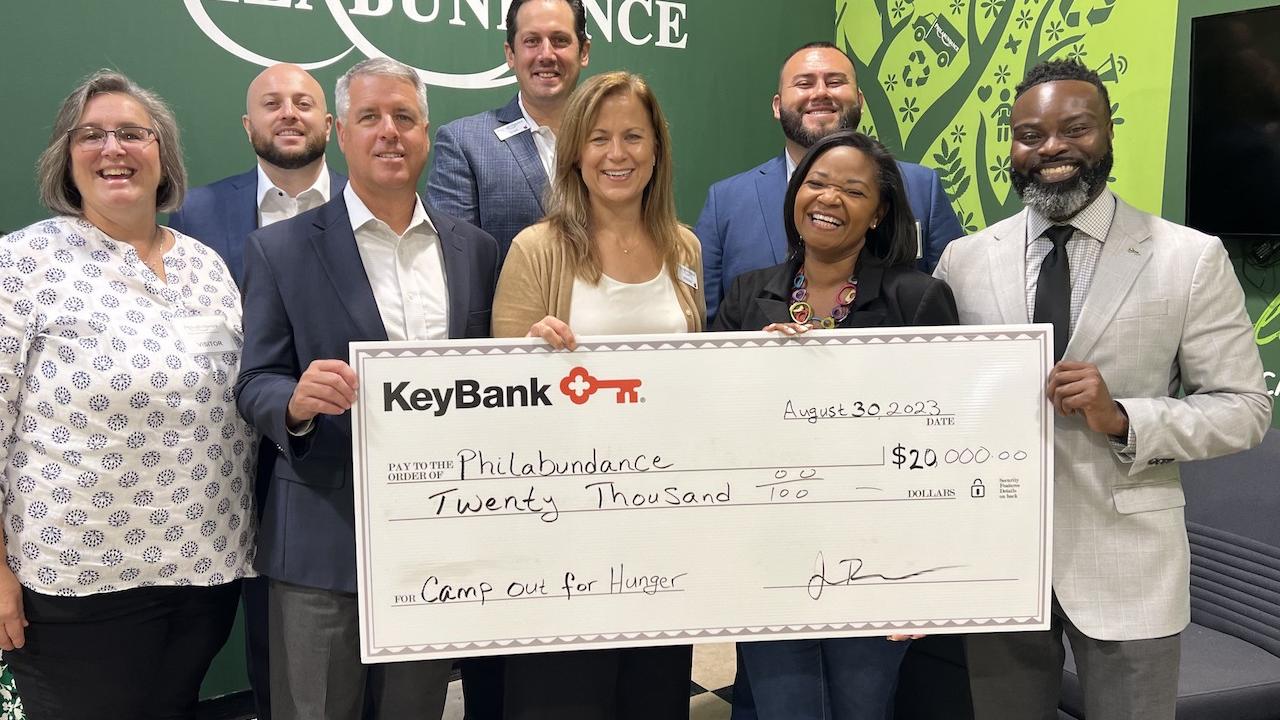 KeyBank presents a check in the amount of $20,000 to Philabundance Inc. From left to right: From left to right: Julie Vetack, Key@Work Relationship Manager, KeyBank; Robert Lombardo, Area Retail Leader, KeyBank; Jamie Tranfalia, Market President, KeyBank; Scott Fremont, Director of Individual Giving, Philabundance; Kristine DelMonte, Chief Development Officer, Philabundance; Juan Hurtado, Branch Manager, KeyBank; Loree D. Jones Brown, CEO Philabundance and Chiwuike Owunwanne, Corporate Responsibility Office