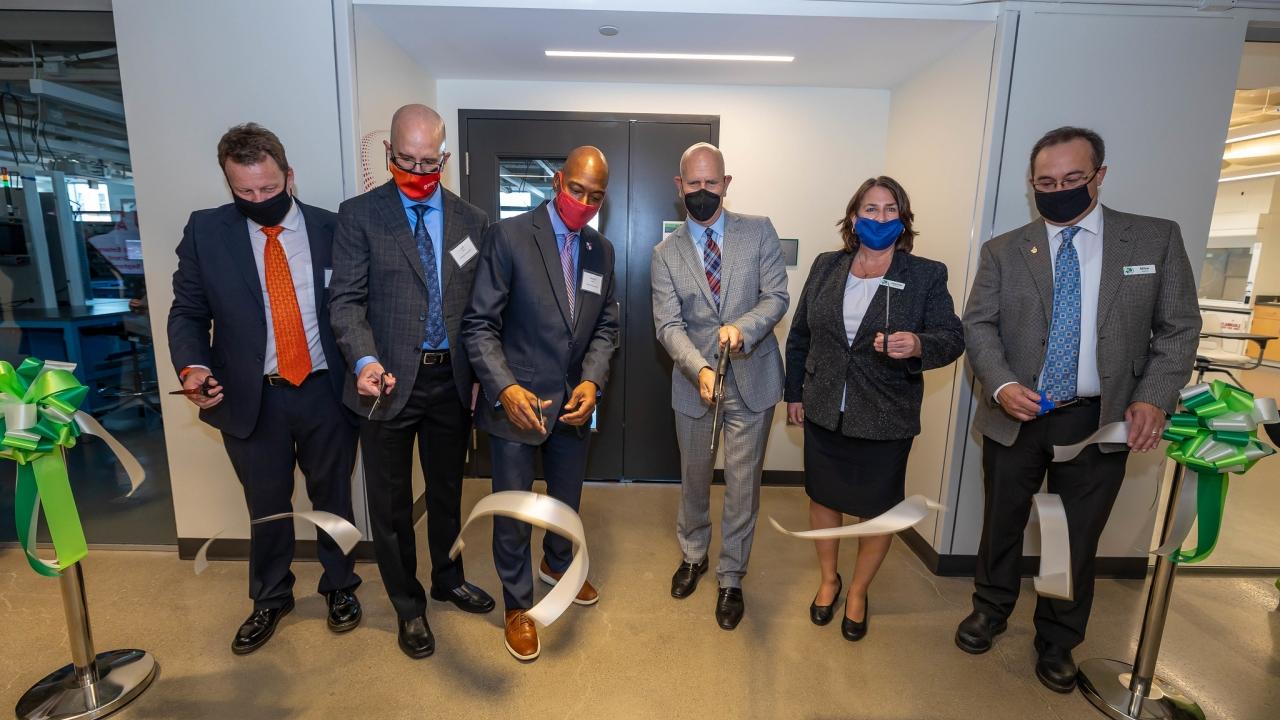 (From L to R) Rockwell’s Michael Cook, Jeff Petro, and Marzell Brown; CSU President Harlan Sands, Interim Washkewicz College of Engineering Dean Joanne Belovich, and Engineering Technology Department Chair and Professor Michael Adams celebrate the grand opening of the Rockwell Automation Connected Enterprise Laboratory.