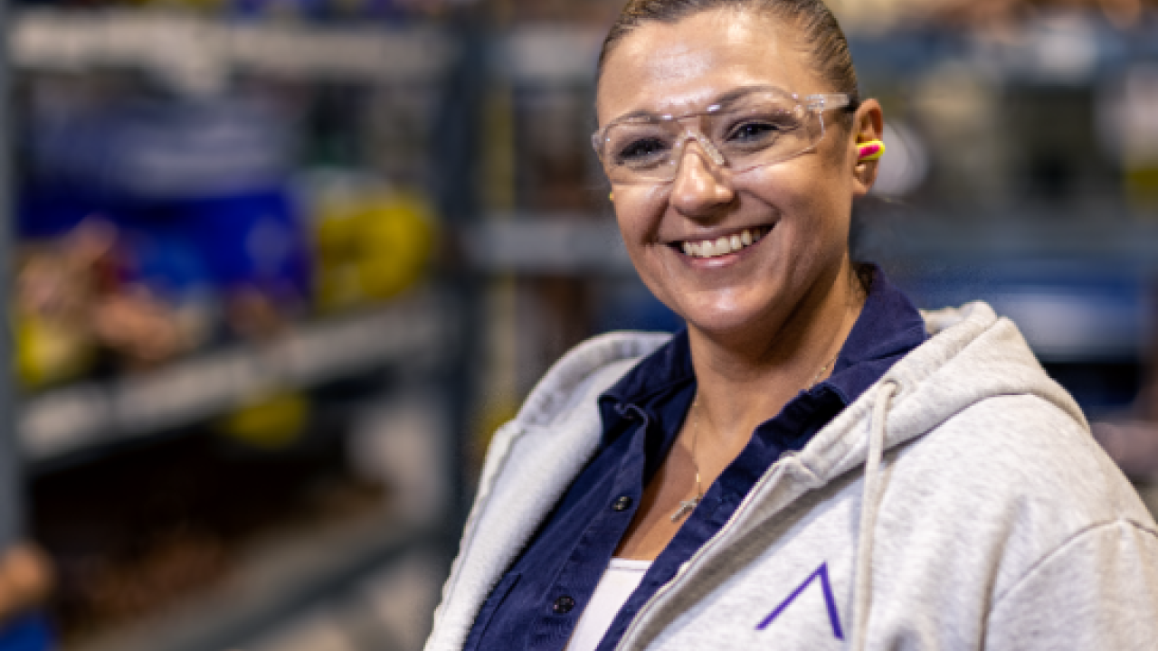 Person smiling with safety goggles