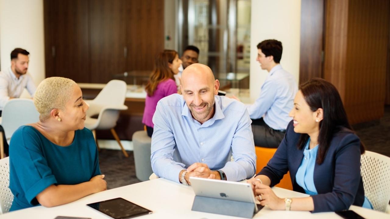 3 people in conversation