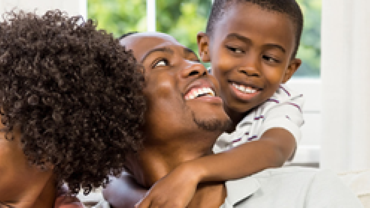 black family hugging each other