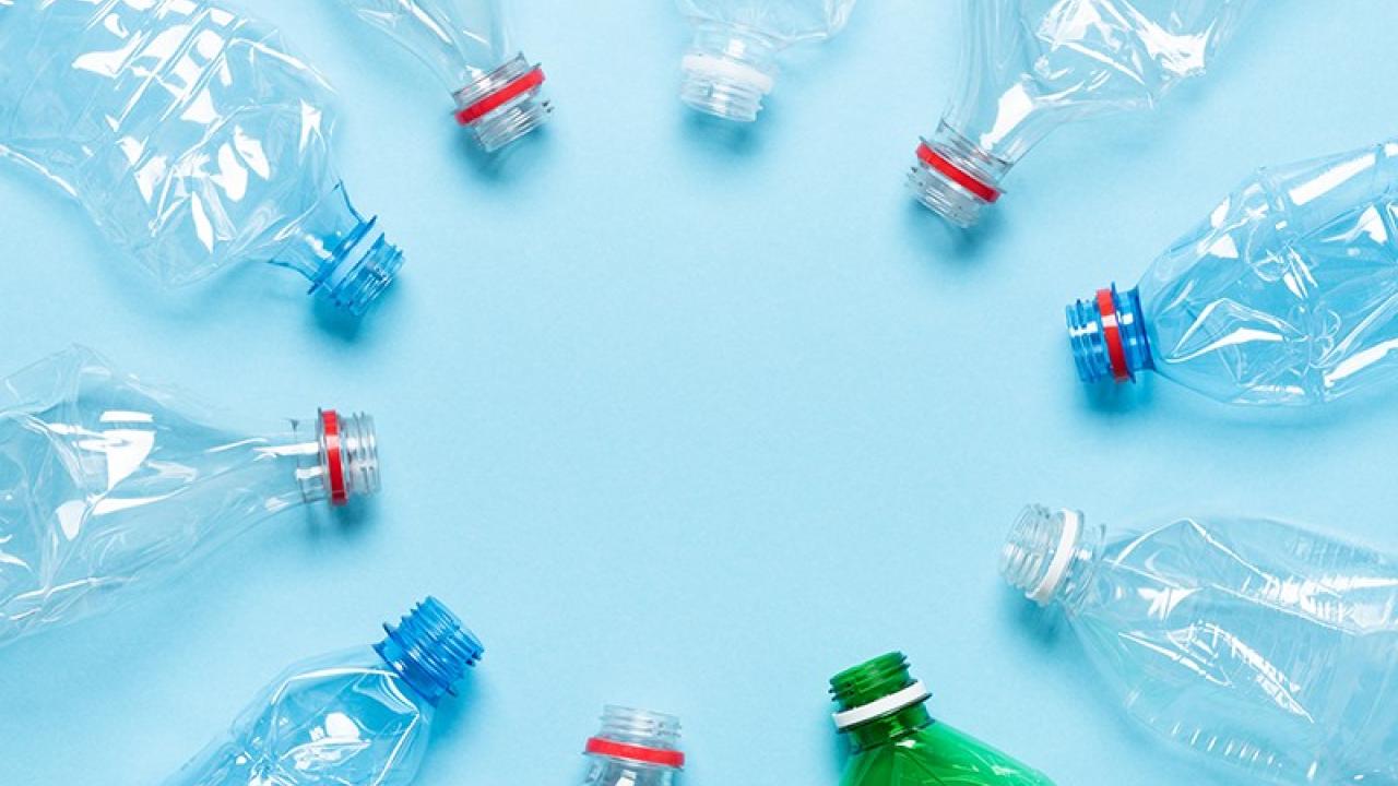 Empty, crumpled, plastic bottles arranged in a circle