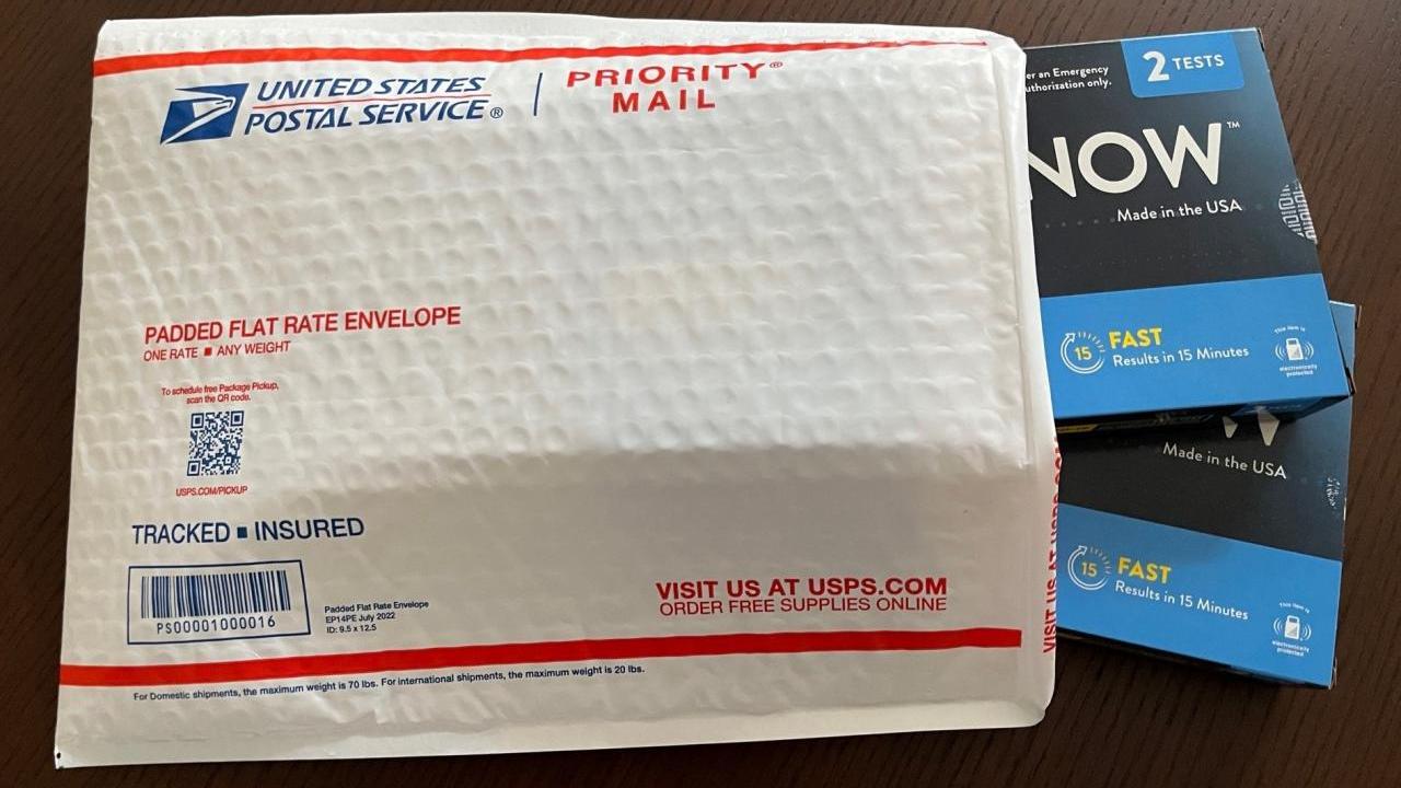 Photo of a cushioned postal mailer containing two Covid test kits