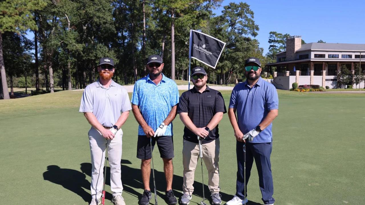 Four golfers