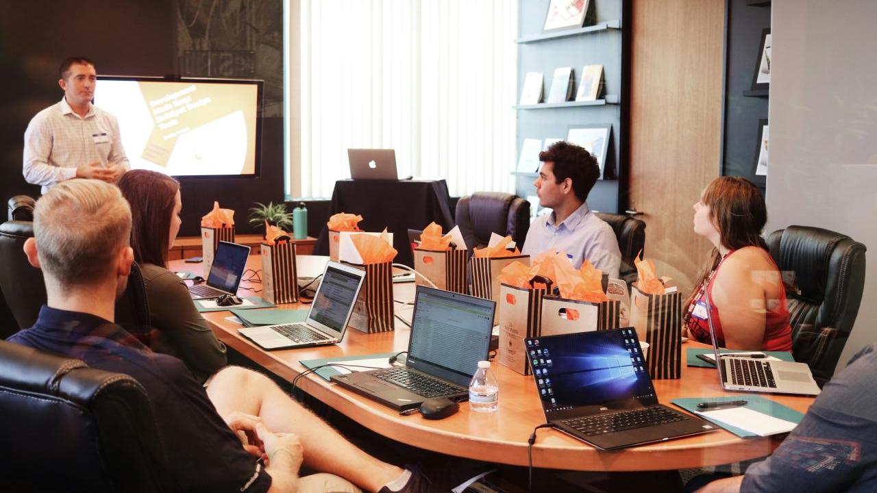 Employees in a conference room.