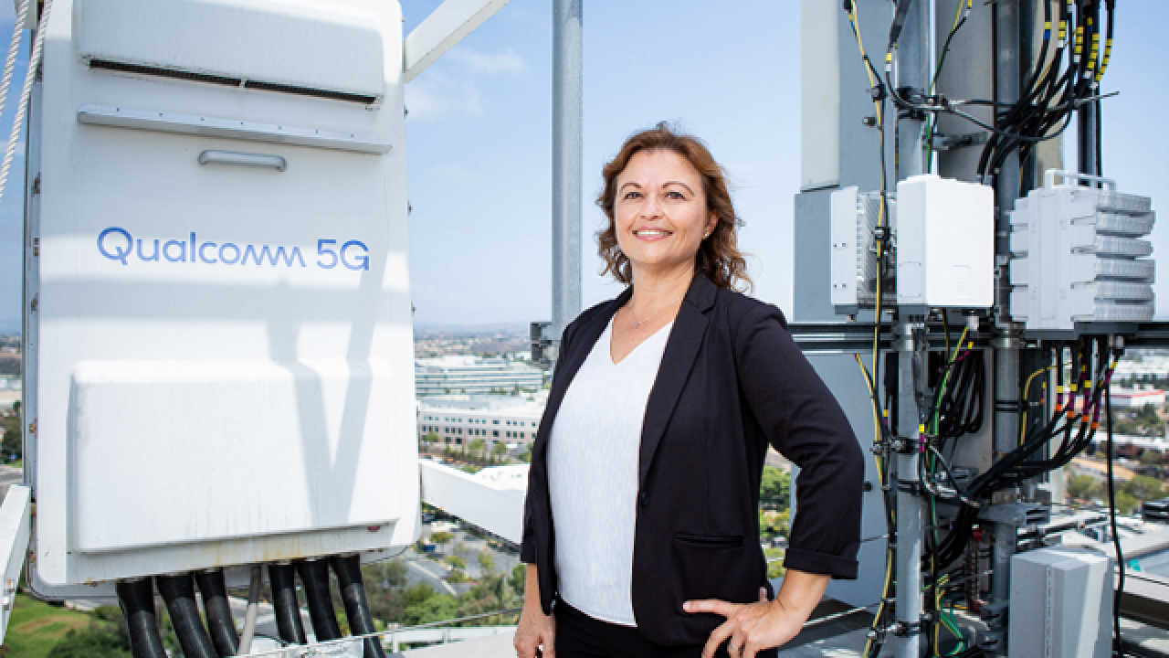 Dr. Yeliz Tokgoz poses with 5G technology
