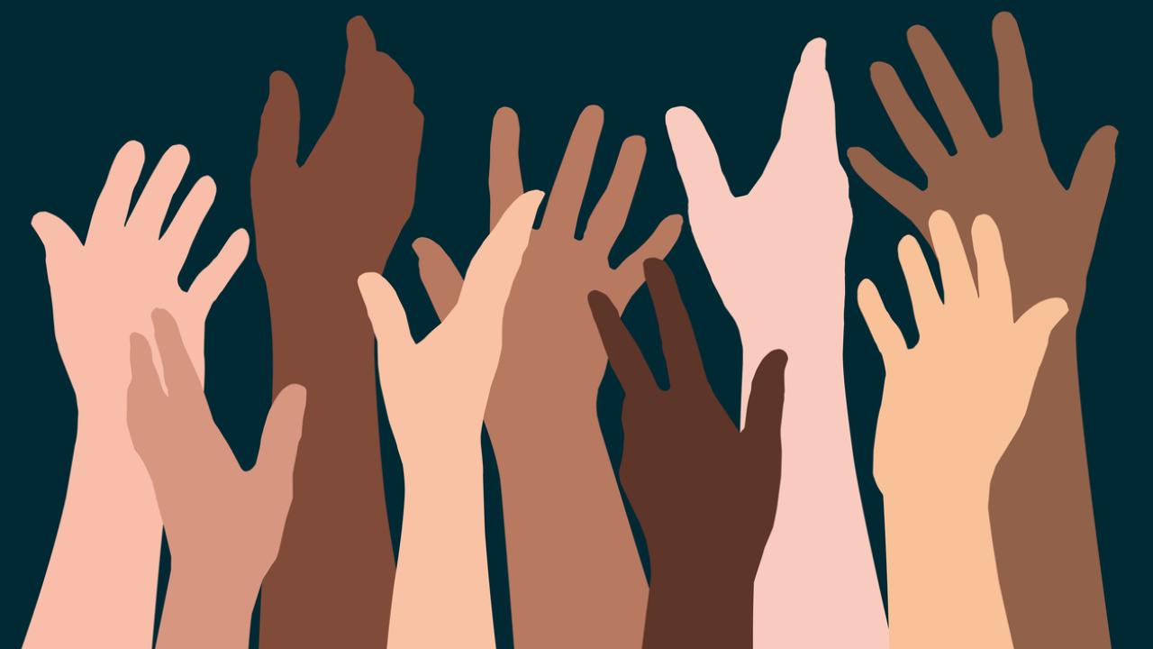artistic representation of many different hands reaching upward