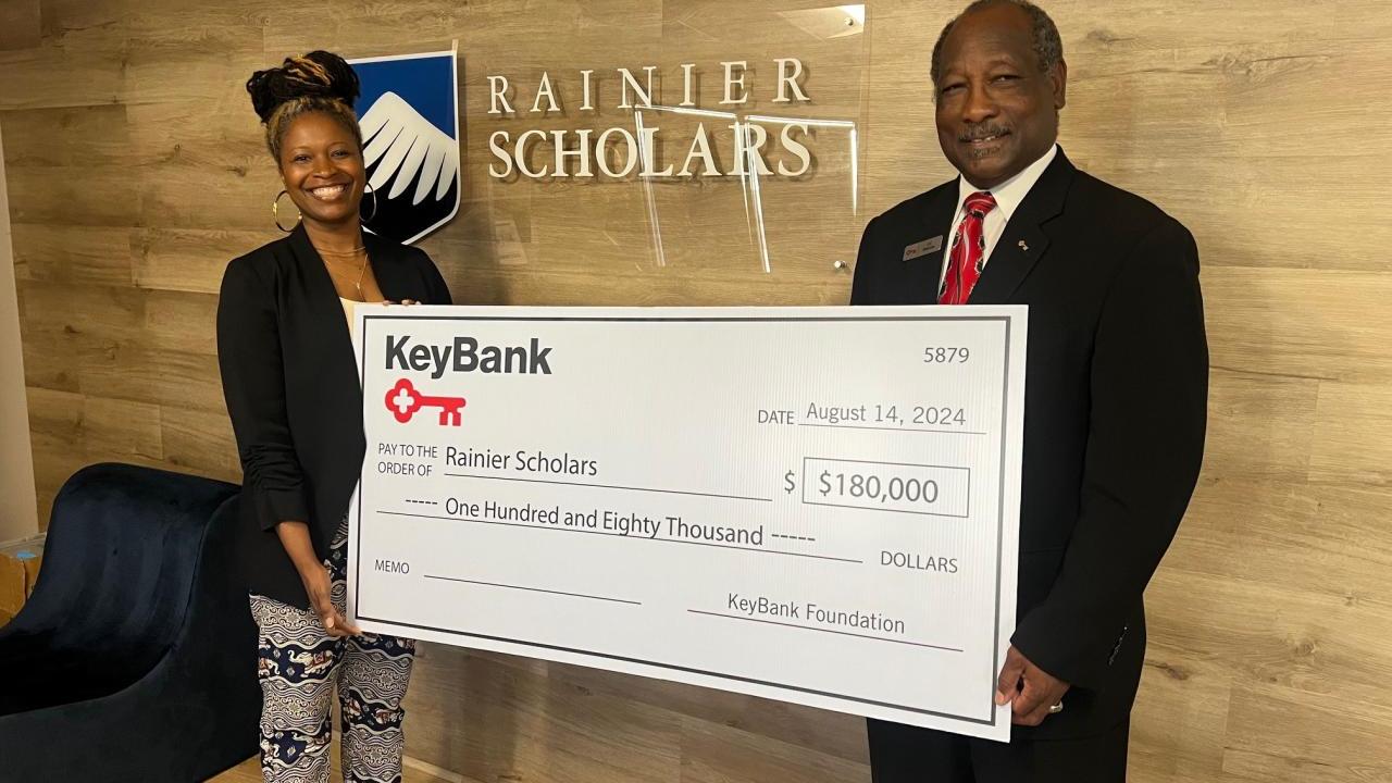 Representatives from Rainier Scholars receive a grant check from KeyBank for $180,000.