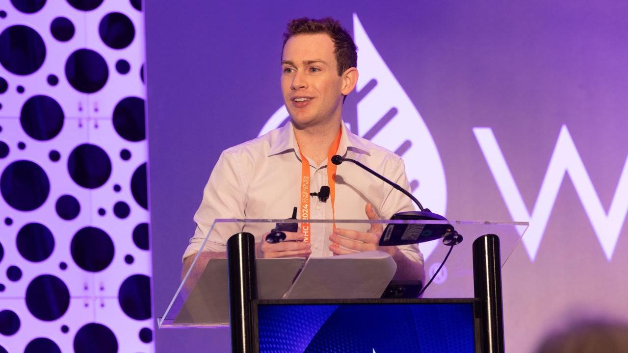 Matthew Cappucci speaks onstage