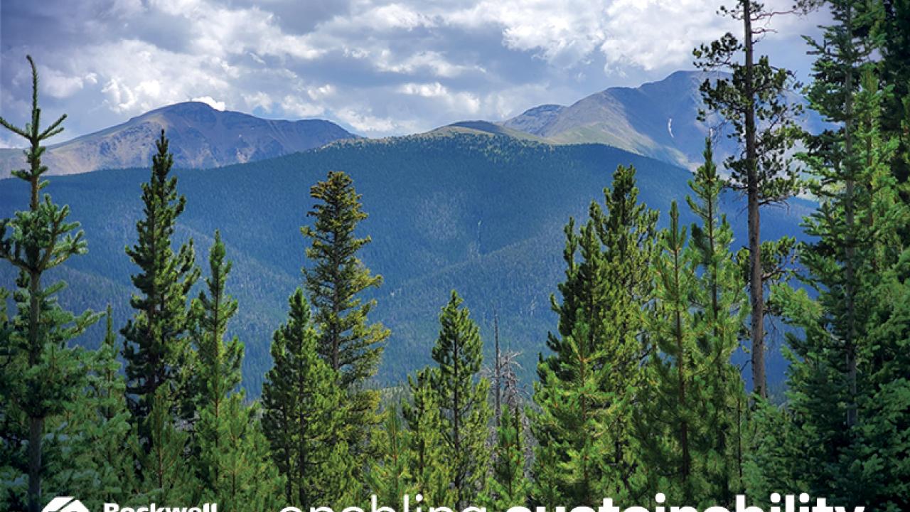 "enabling sustainability 2023 report" with logo and image of forest and mountains