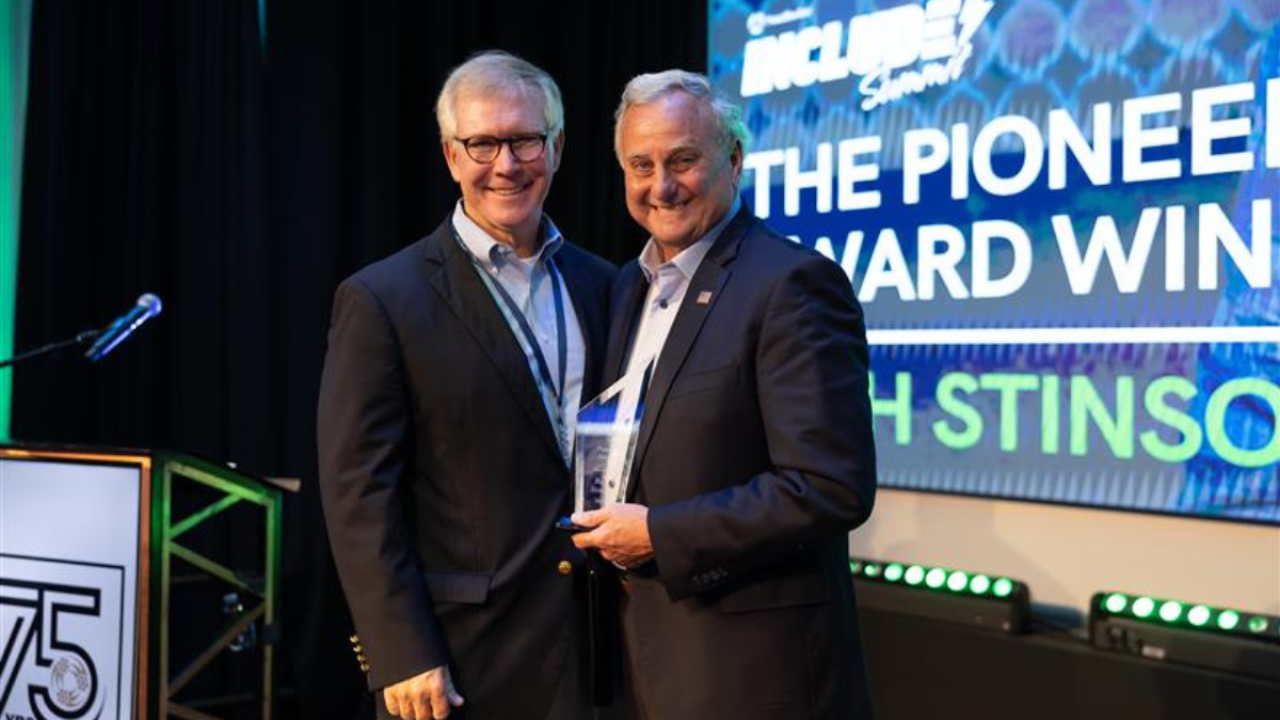 Southwire's Chief Supply Chain Officer, Charlie Murrah, presenting Southwire CEO Rich Stinson with the Pioneer Award