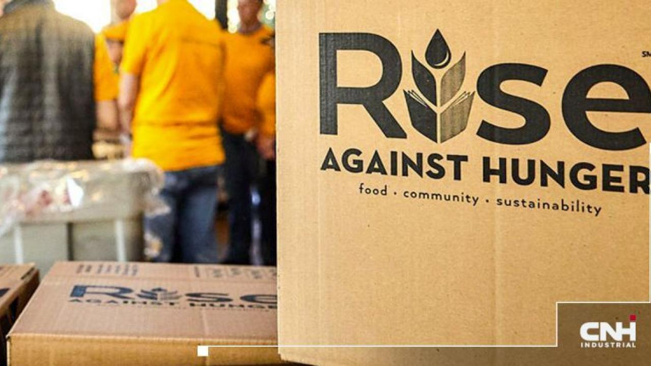 "Rise Against Hunger" written on boxes