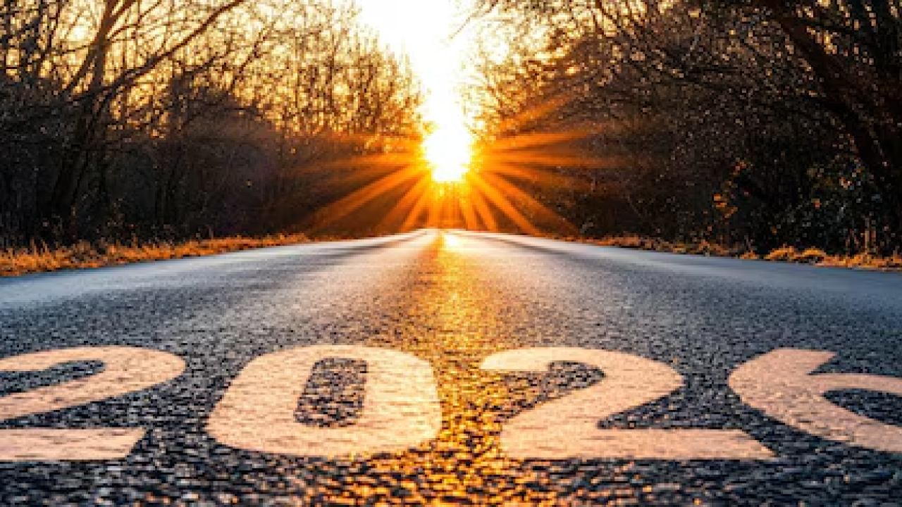 Road with setting sun and 2026