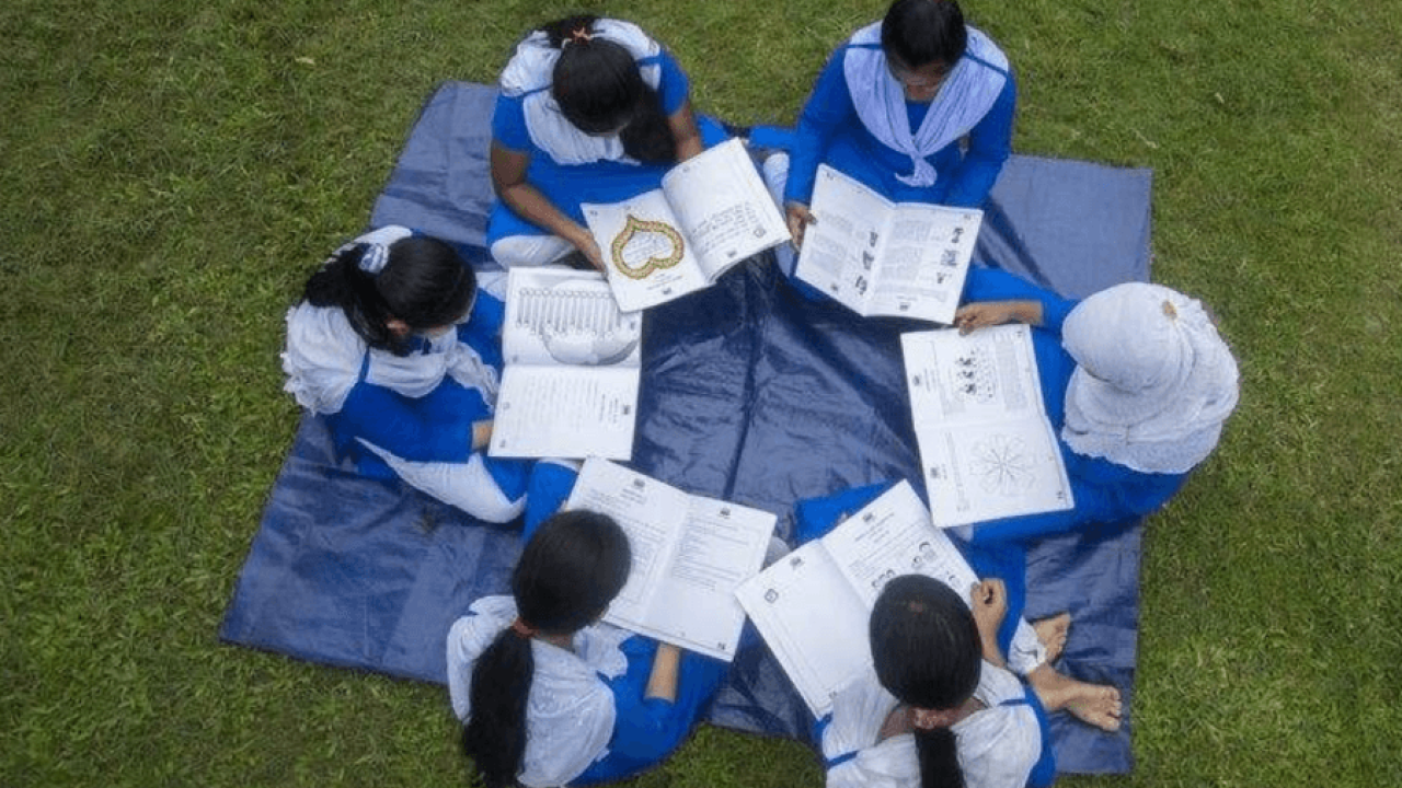 circle of girls reading