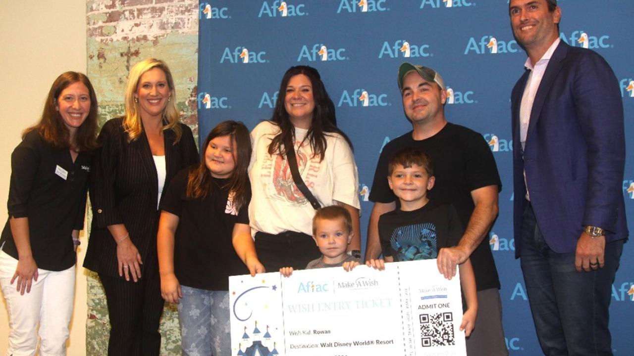 Rowan and family shown with Aflac and Make-A-Wish South Carolina representatives.