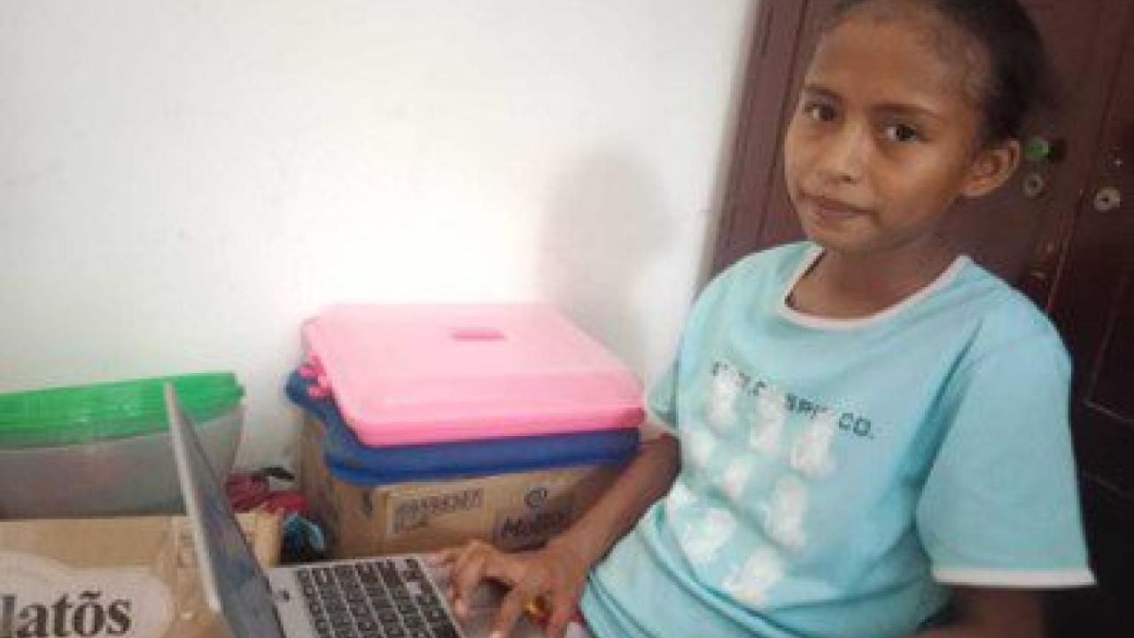 A child using a laptop