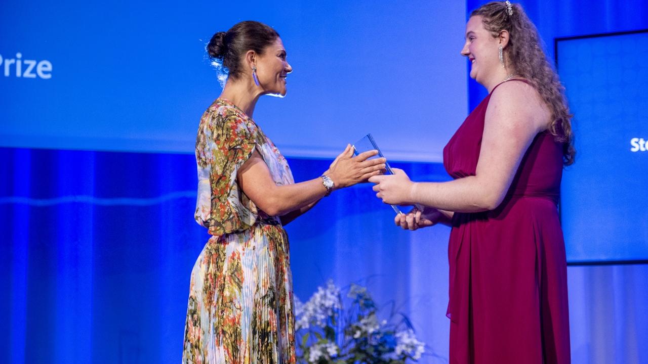 the winner accepts her award