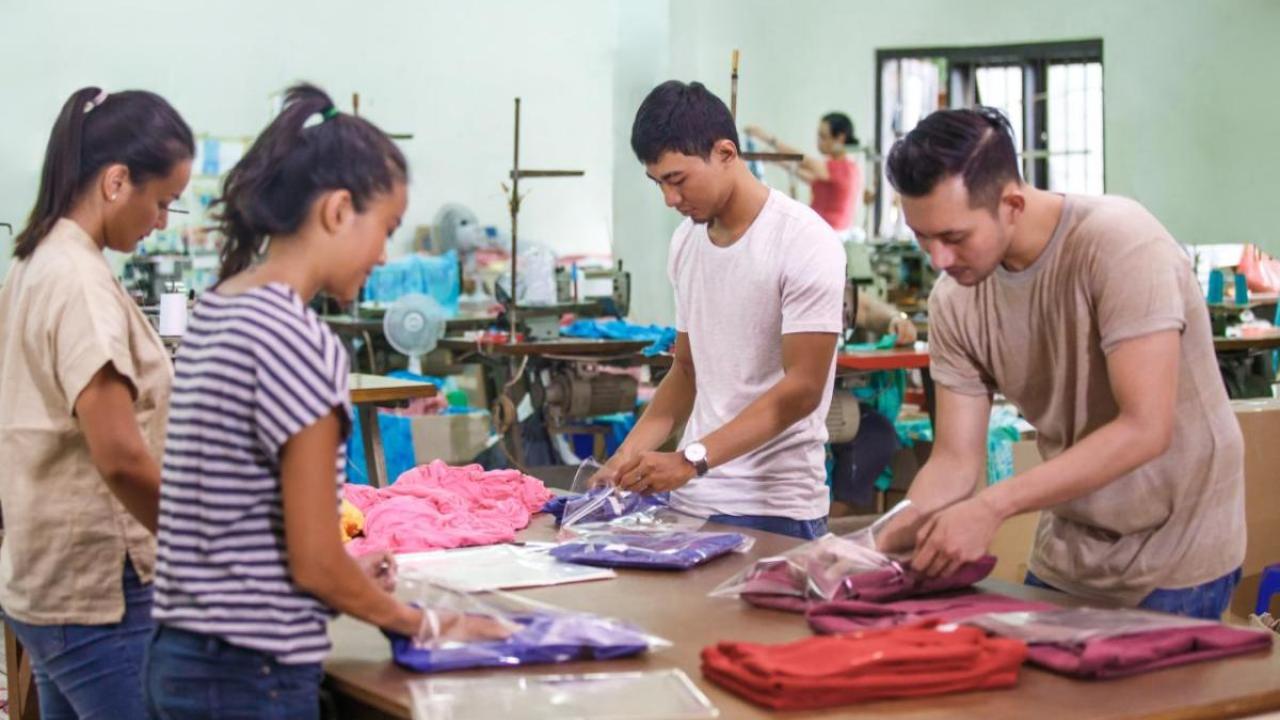 people working at a garment factory