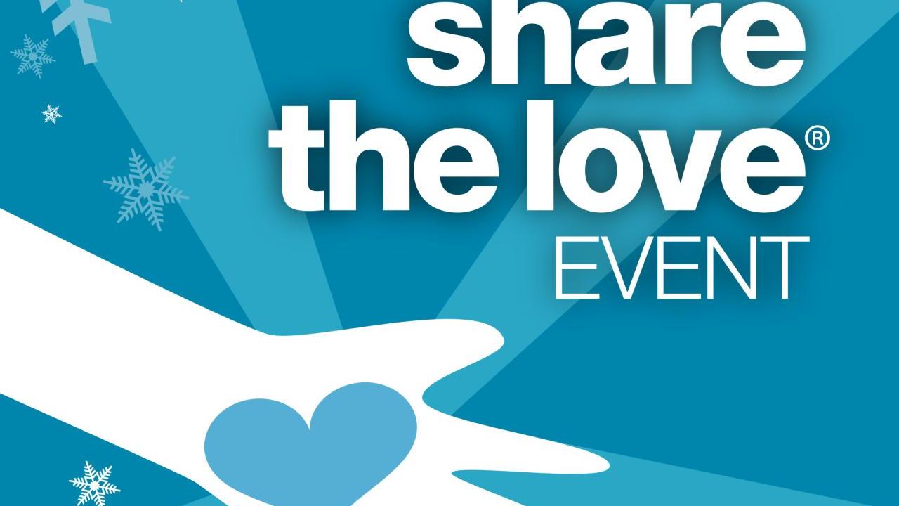 SUBARU share the love event logo, blue black ground with snowflakes and a hand with a blue heart on the the palm 