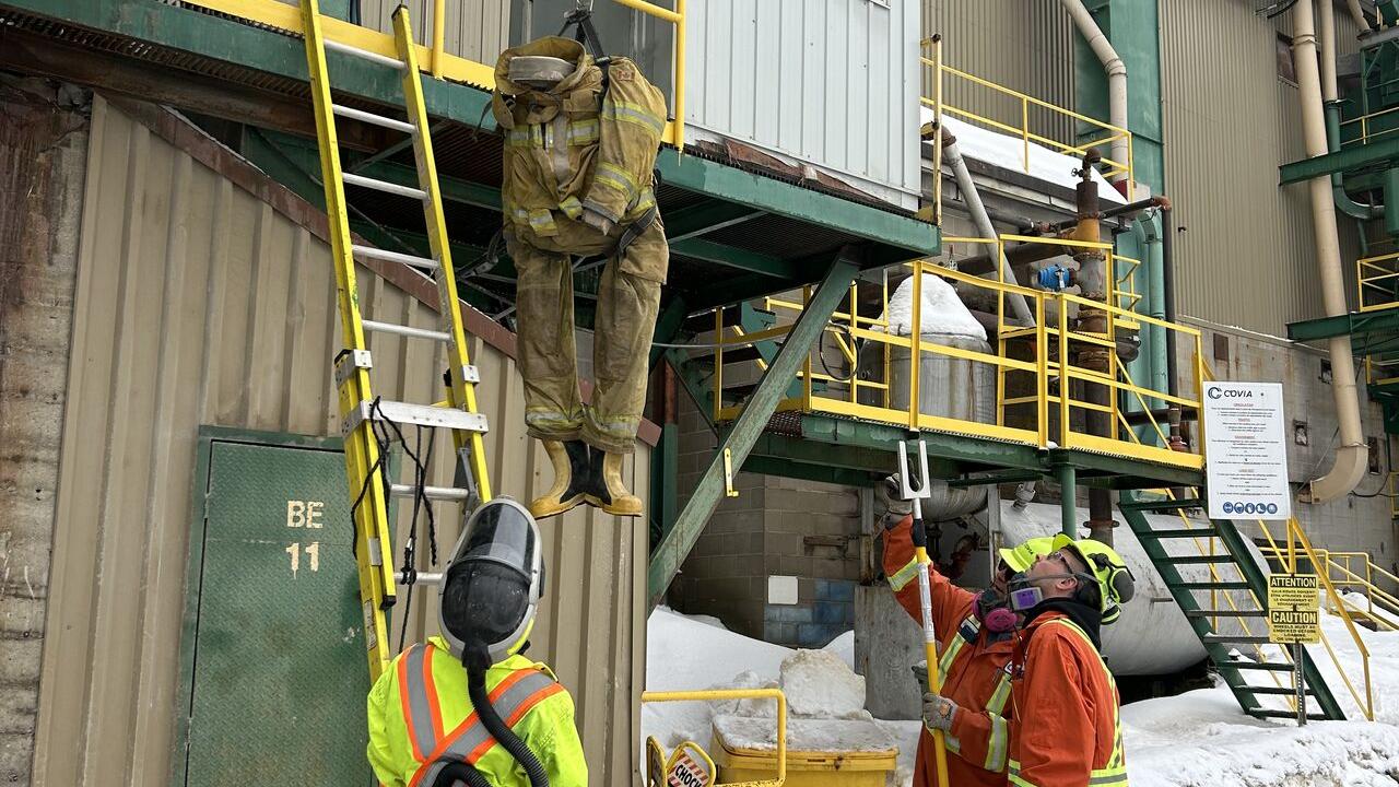 safety crew looking at a building