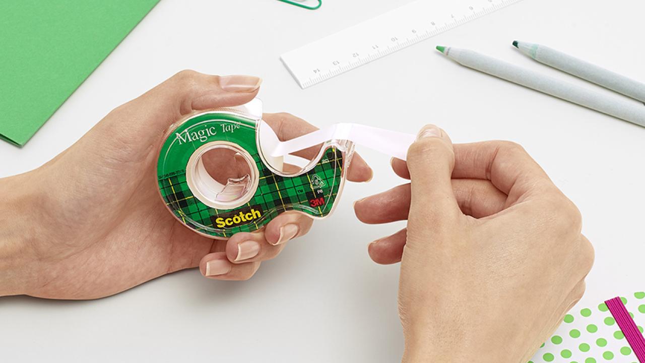 Roll of scotch tape shown being utilized.