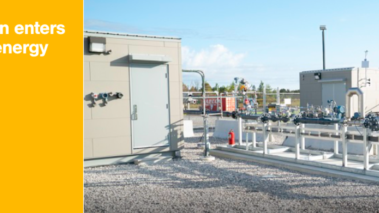 Power plant with yellow banner reading, "Clean hydrogen enters the Markham energy mix"