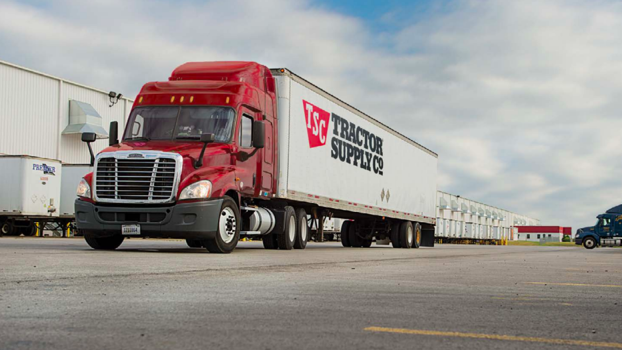 A Tractor Supply delivery truck in a parking lot