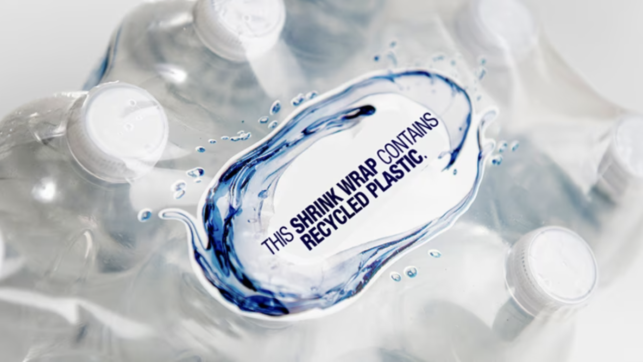Bottles Shrink wrapped with the text 'This shrink wrap contains plastic'