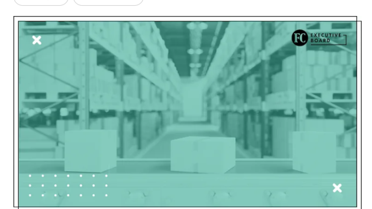 A modern warehouse with shelves of stacked boxes and an automated conveyor system, representing the transformation of global supply chains toward technology, efficiency, and resilience.