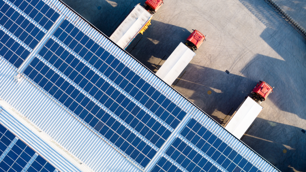 solar panels and truck trailer at rooftop facility