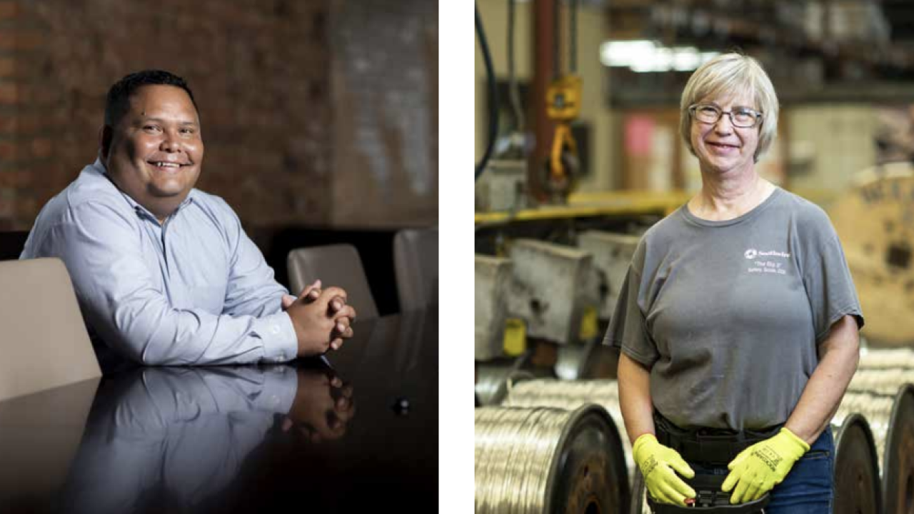 2 employees smiling