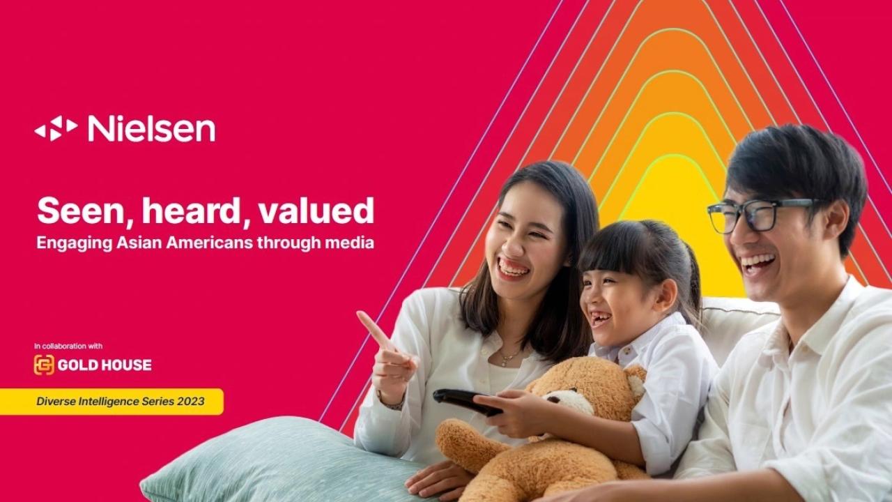Nielsen: Seen, heard, valued. Asian family shown watching TV.