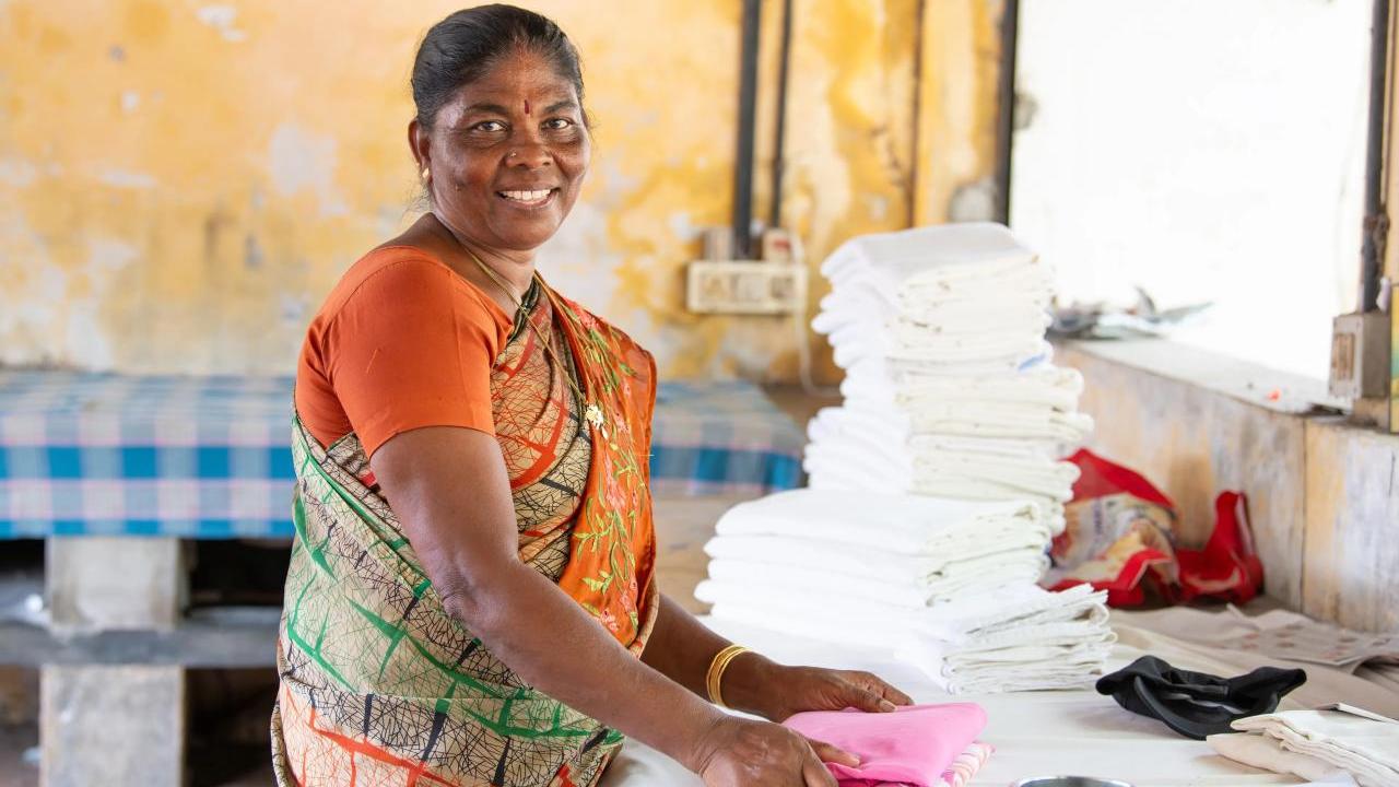 Woman folding cloth