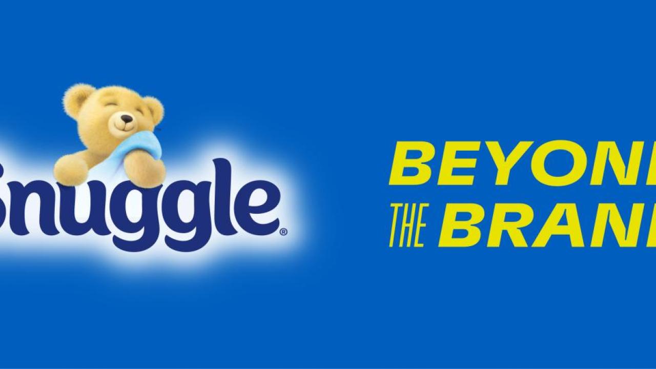 Snuggle logo with the text "beyond the brand"