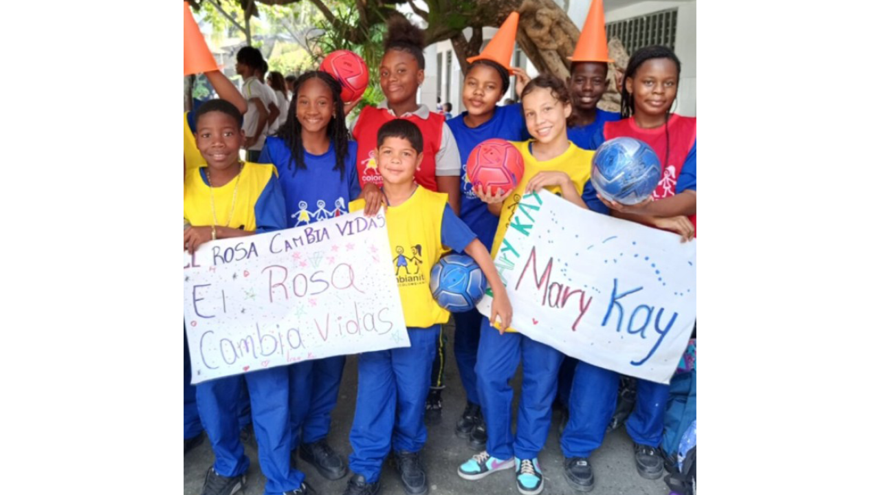 students holding up signs