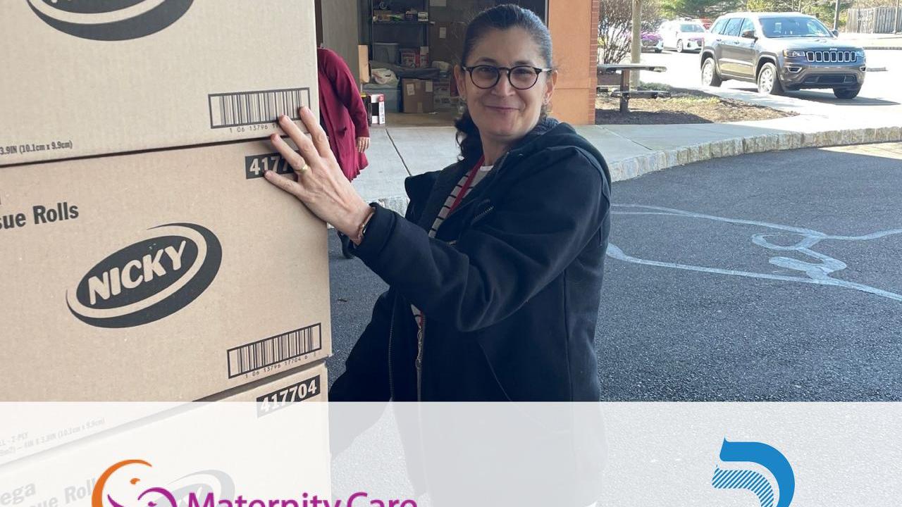 Angie Bellow, Maternity Care Coalition receiving the delivery