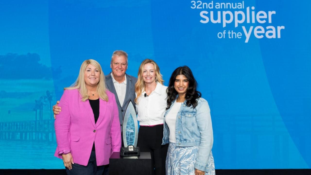 GM Supplier of the year award. HARMAN Team shown accepting the award.