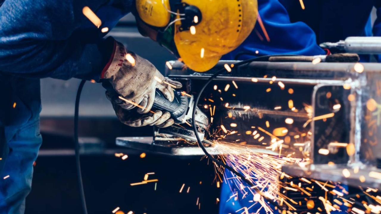 person working at a machine