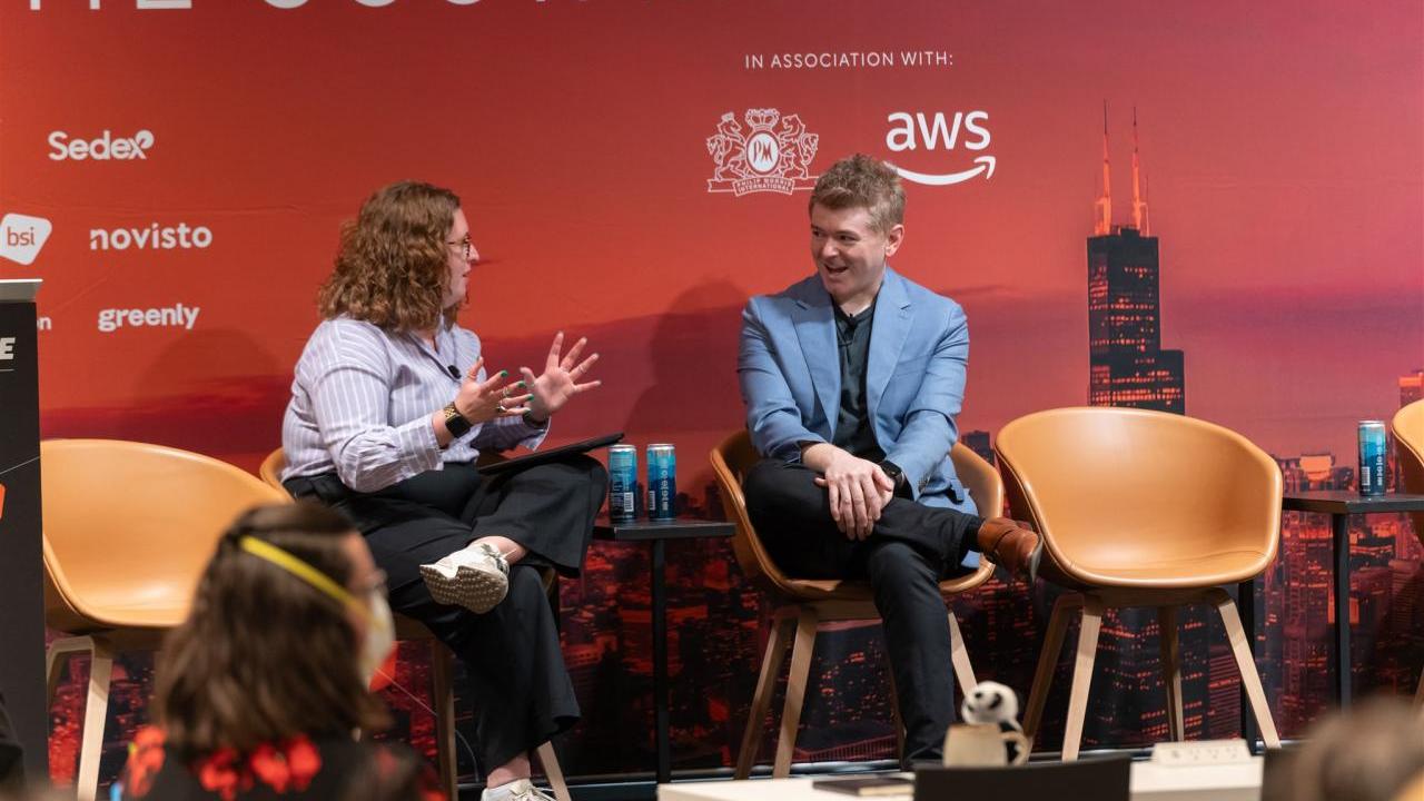 Two speakers in conversation on stage at the Sustainability LIVE Chicago 2025 event.