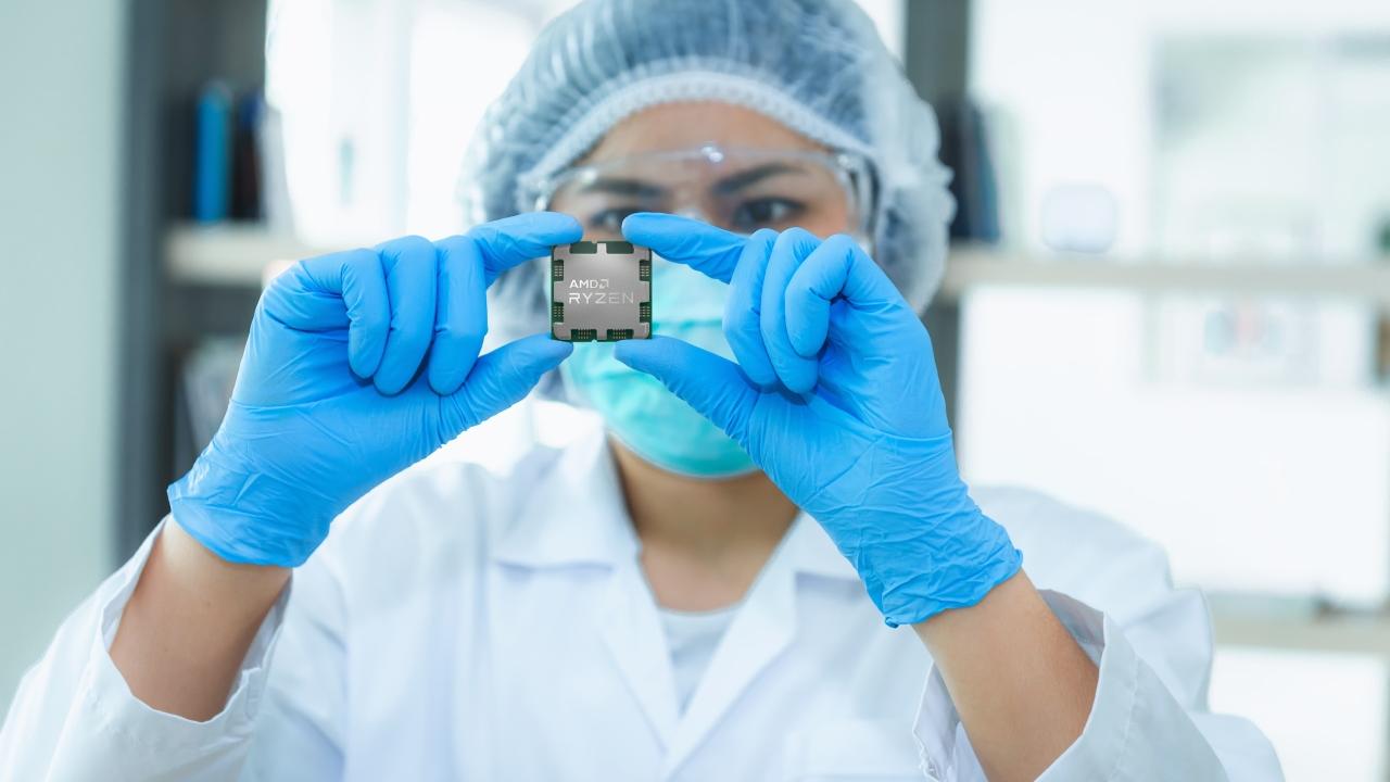 person in scrubs and gloves looking at a chip