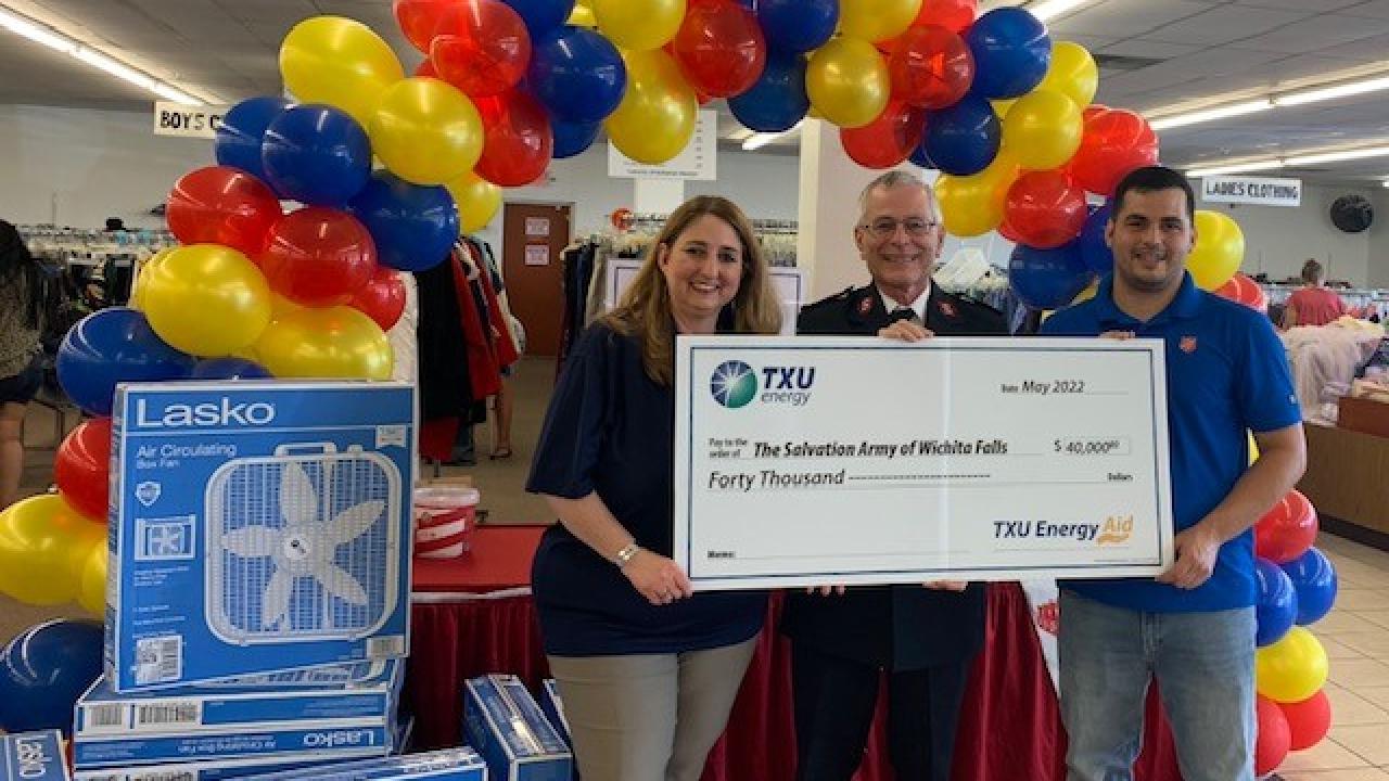 TXU Energy, kicks off 2022 Beat the Heat Program with balloon rainbow, fans, a/c's and a big check