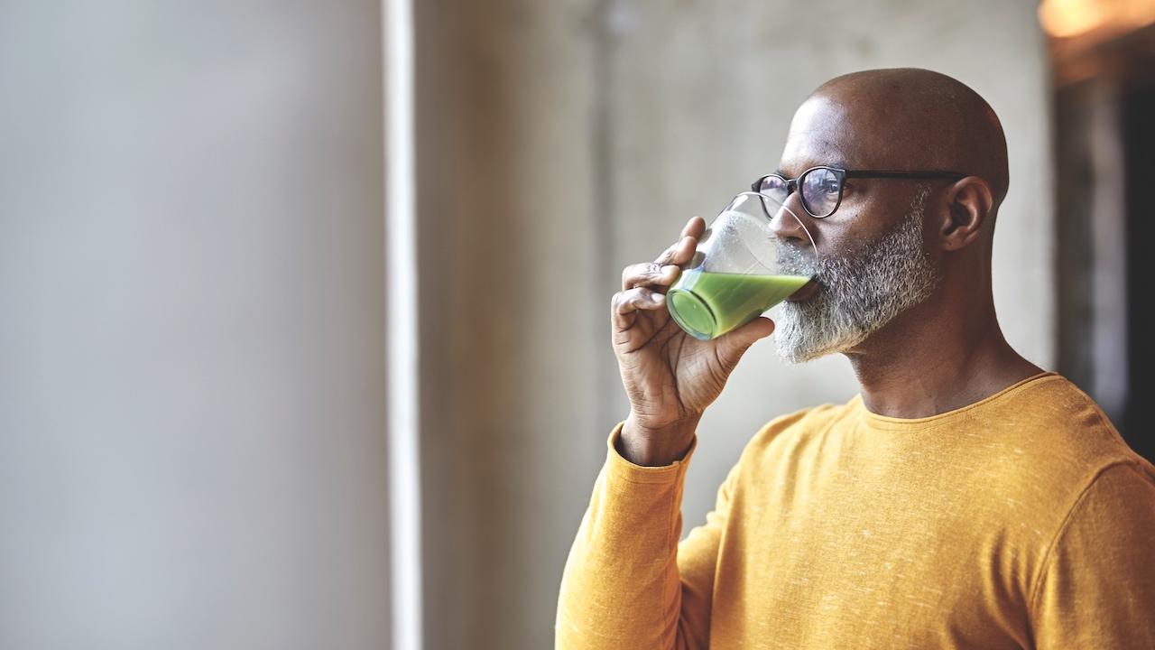 Tetra Pak image of man drinking juice