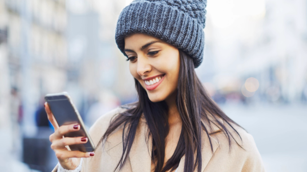 Woman looking at cell phone