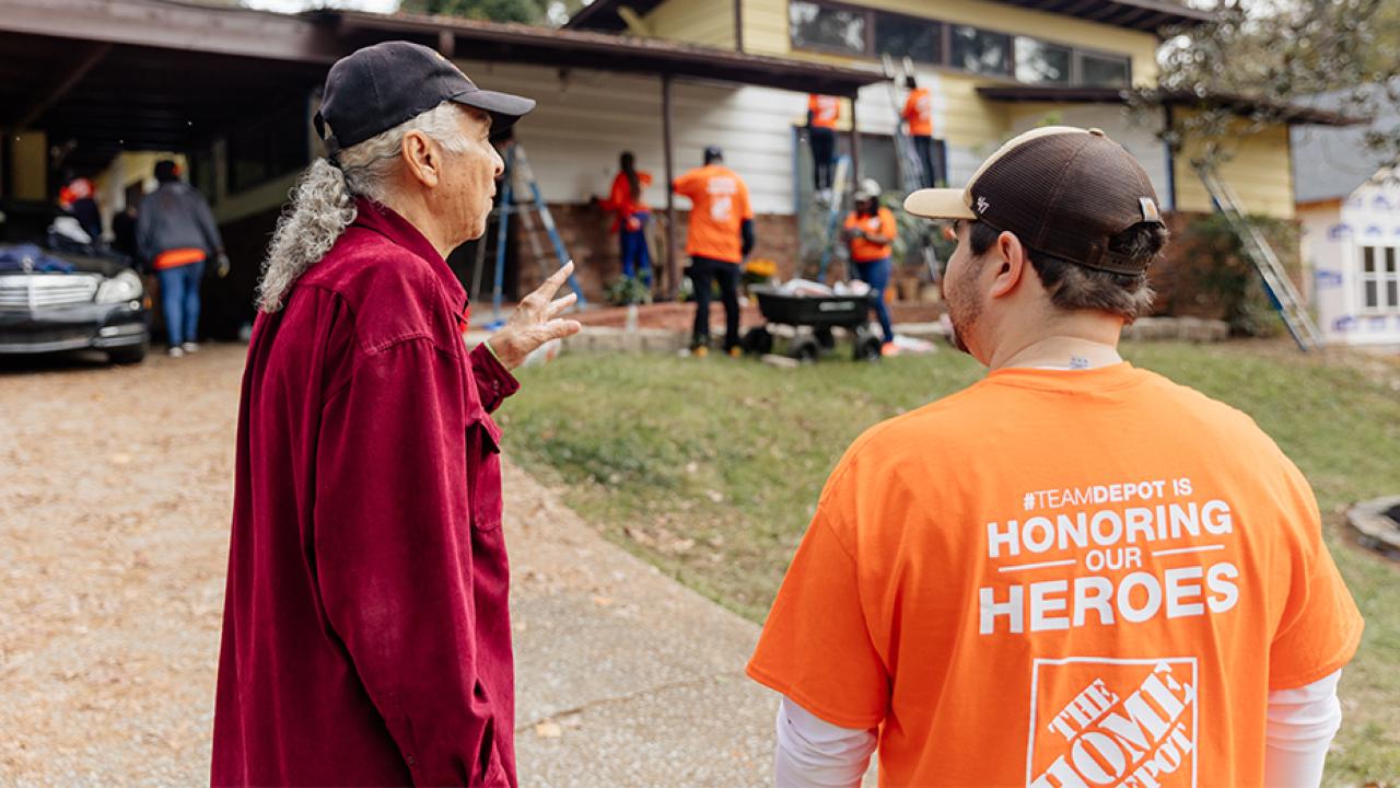 The Home Depot Foundation volunteers work on a house.
