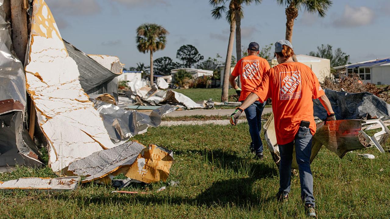 The Home Depot volunteers shown helping with disaster clean up in Florida.
