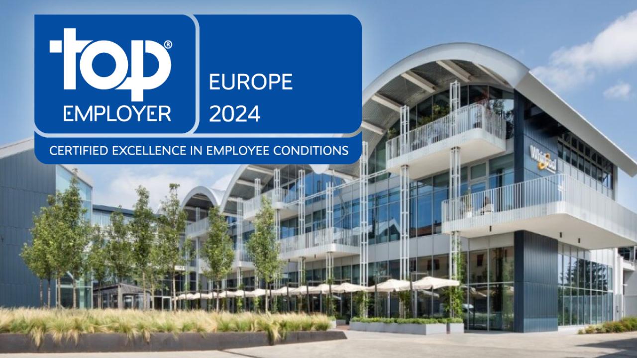 A Whirlpool Corporation building with the Top Employer Europe 2024 logo